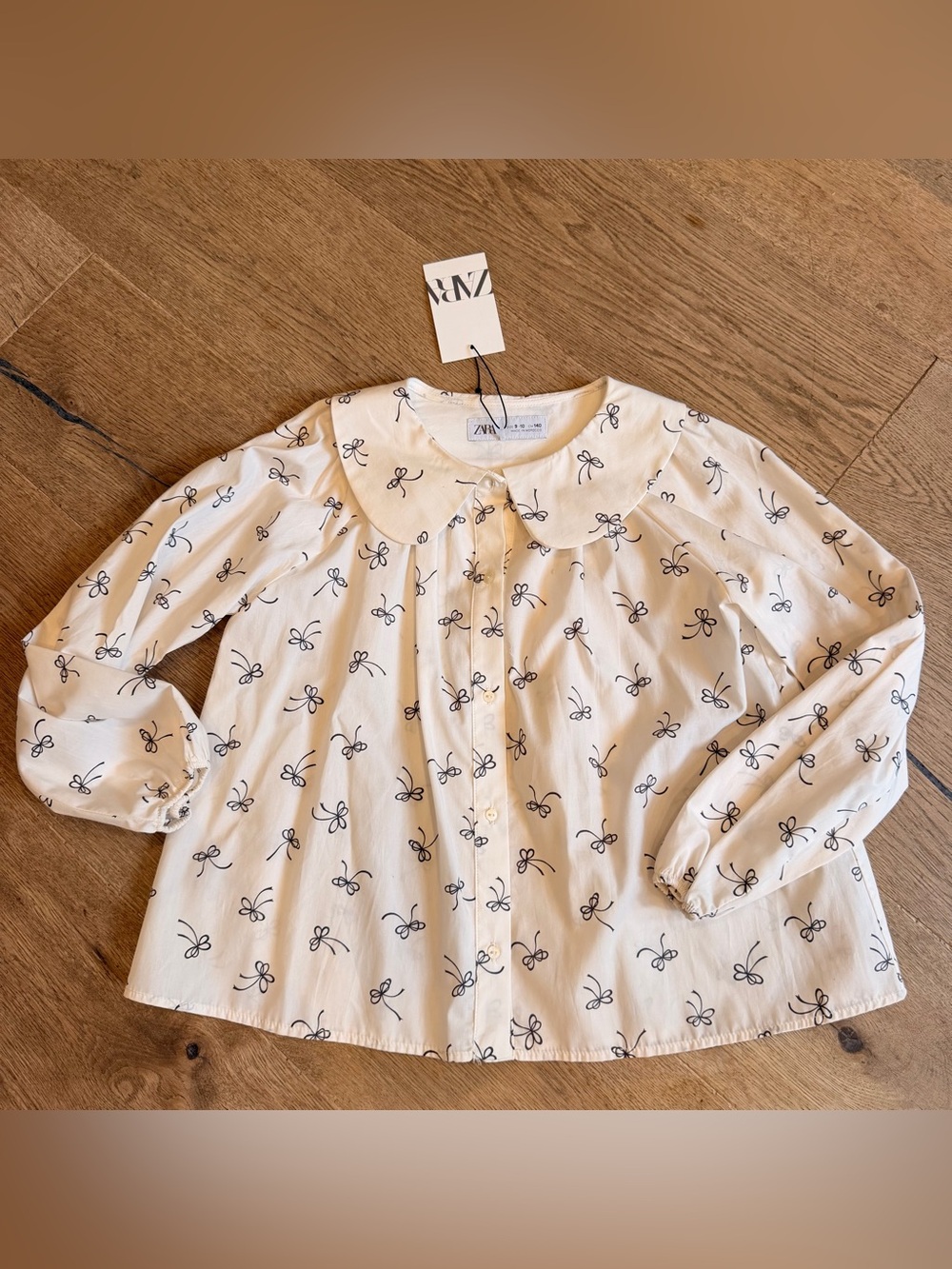 Zara Cream Long-Sleeve Blouse with Black Bow Print NWT